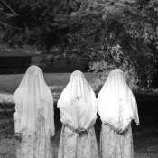 Three veiled